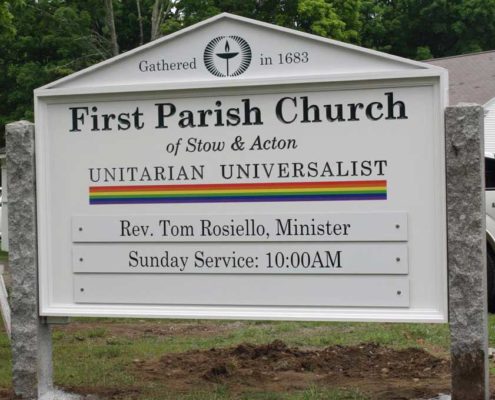First parish carved wood sign with grantie posts